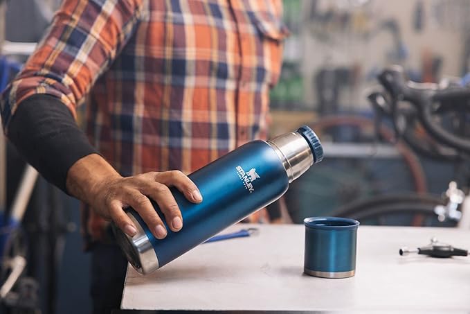 STANLEY Adventure To Go Insulated Travel Tumbler - 1.1QT - Leak-Resistant Stainless Steel Insulated Bottle with Insulated Cup Lid and Splash-Free Stopper
