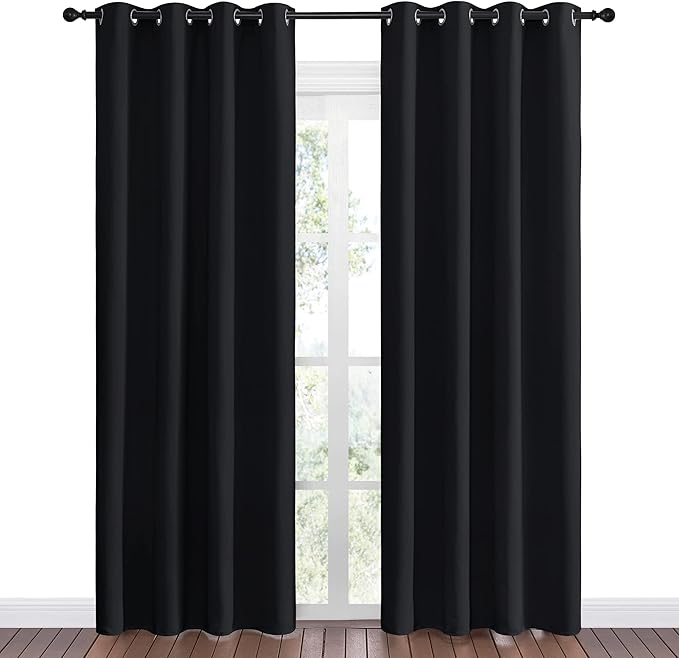 NICETOWN Halloween Blackout Curtain Panels 86 inches - Light Reducing Thermal Insulated Solid Grommet Blackout Curtains/Panels/Drapes for Living Room (Set of 2, 55 inches by 86 Inch, Black)