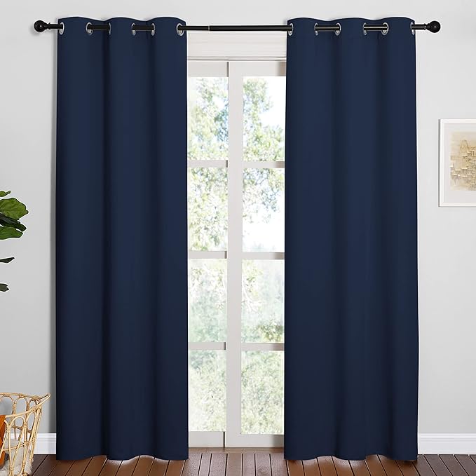 NICETOWN Window Treatment Energy Saving Thermal Insulated Solid Grommet Blackout Curtains/Drapes for Living Room (Navy, 1 Pair, 42 by 84-Inch)